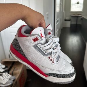 Air Jordan White and Red Sneakers